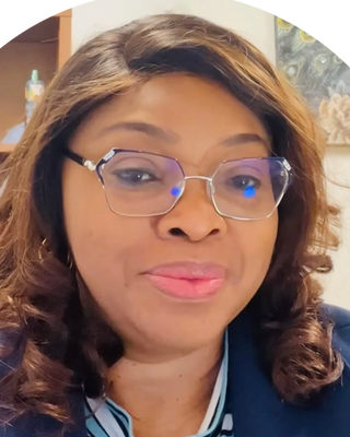 Photo of Lanre Olanrewaju, Psychiatric Nurse Practitioner, PMHNP