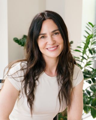 Photo of Laura M. I. Dziekiewicz - Move Therapy and Wellness, LCSW, TIYT, LPC, E-RYT, LCPC