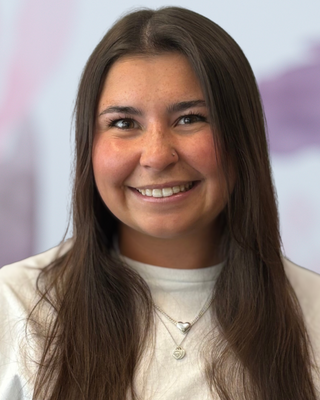 Photo of Cait Mangini, Pre-Licensed Professional