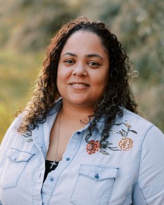 Photo of Moni Dominique Knowles-Tuiloma, Pre-Licensed Professional