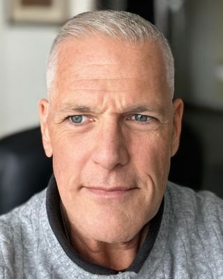 Photo of Dr. John M. Brion, Psychiatric Nurse Practitioner, PhD, PMHNP-C