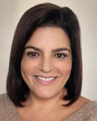 Photo of Aiysha Nasser, Counsellor, MBACP