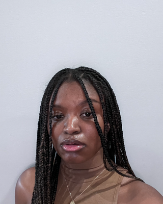 Photo of Michelle Akinwale, Pre-Licensed Professional, MBioMed, MA, QMHP