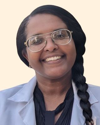 Photo of Ikram Hassan, Pre-Licensed Professional, PsyD, Post D