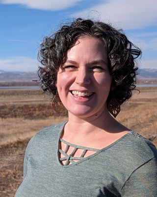 Photo of Lauren Simpson, Psychologist, LP, Psy D, TIYT, CCTP-II, CYT