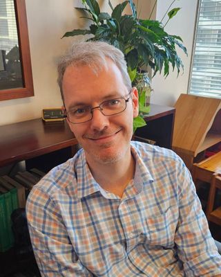 Photo of Brett Jacobson, Psychologist, MPsych, PsyBA - Couns. Psych.