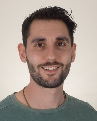 Photo of Simon Erlich, Registered Psychotherapist (Qualifying), MA, MACP, CCC