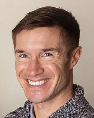 Photo of Keenan Krick, Counselor, PhD, LMHP, NCC