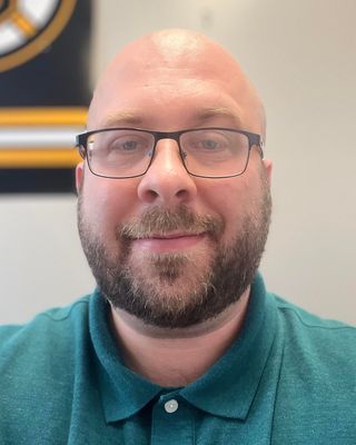 Photo of Mateusz Marcinowski, Licensed Mental Health Counselor, LMHC, LPC