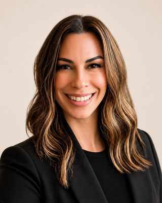 Photo of Mindi Lobuzzetta, Counselor, LMHC-D