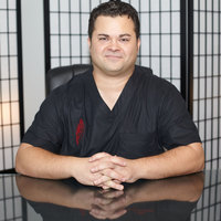 Gallery Photo of Dr. Jason Attaman is board-certified in Pain Medicine.  He is a Seattle Met "Top Doc" in Pain Medicine 2015-2021 and Seattle Magazine "Top Doc" 2019.