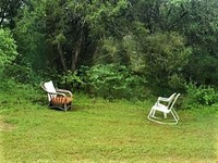 Gallery Photo of Backyard of my home. Chair is sanitized and strict social distancing observed.