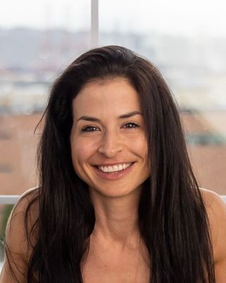 Photo of Annie J., NC-BC, RN, RYT