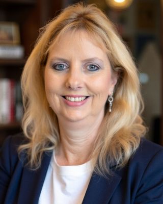 Photo of Kelli Knapp, Licensed Clinical Mental Health Counselor, MA, LCMHC, NCC, LCAS, CCTP
