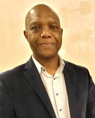 Photo of Dr. Mukwel Aiyuk, Psychiatric Nurse Practitioner, DNP, PMHNP, FNP-BC