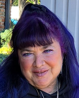 Photo of Taryn Xenia Temmer, Counselor, JD, LMHC, MCAP