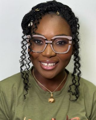 Photo of Bunkola Ojelade, Registered Social Worker, MSW, RSW