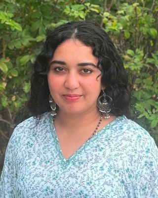 Photo of Iman Moin, Pre-Licensed Professional
