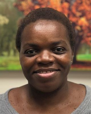 Photo of Consola Esambe, Psychiatrist, MD