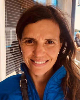 Photo of Mili Sarmiento Shoemaker, Licensed Professional Counselor, MA, LPC, RPT-S