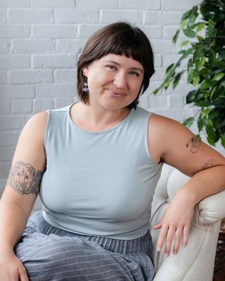 Photo of Kelsey Raftis, Licensed Clinical Professional Counselor, LCPC, MT-BC, MA