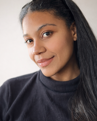 Photo of Adriana Quinones, Pre-Licensed Professional, MA, RYT200