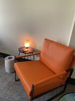 Gallery Photo of Picture of the orange therapy chair, with a separate table