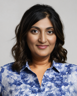 Photo of Alisha Fernandes, Psychologist, PsyM, MSc