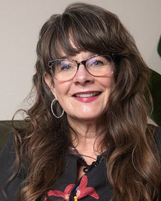 Photo of Ginger (Virginia) Hemming, Licensed Mental Health Counselor, LMHC, ATR, LPC
