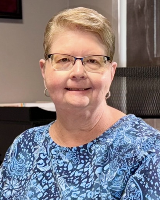 Photo of Anne Tapley, Licensed Mental Health Practitioner, PhD, LMHP, CPC, LLC