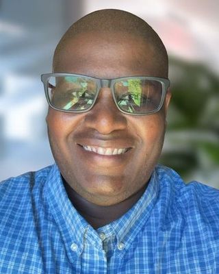 Photo of Aloys Kenyoru, Psychiatric Nurse Practitioner, MSN, PMHNP, he, him