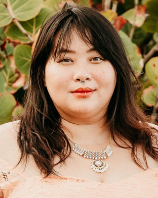 Photo of Michi Marks, Pre-Licensed Professional