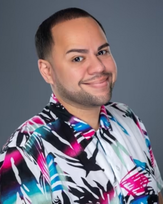 Photo of Wilfredo Guzman, Licensed Mental Health Counselor, LMHC