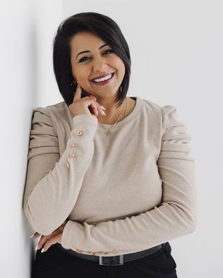 Photo of Esha Jain, Registered Psychotherapist, BA, MD