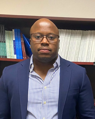 Photo of James Abiola, Psychologist, LP