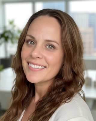 Photo of Erin Corbett, Licensed Professional Counselor, MA, LCMHC, QCS