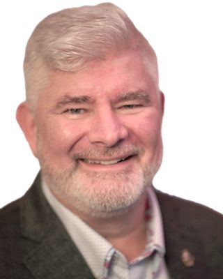 Photo of Rev. Gordon Mintz, Registered Psychotherapist (Qualifying), CD, MDiv, MDS, MACP, RP(Q)