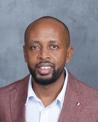 Photo of Collins Izimba, Psychiatric Nurse Practitioner, PMHNP