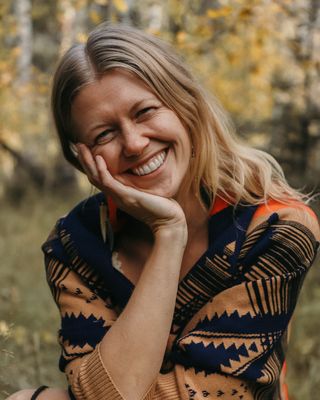 Photo of K. Moxie Bauschke, Counselor, LMHC, E-RYT