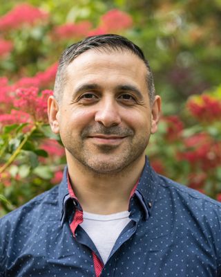 Photo of Alim Awadia, Psychologist, PhD, RPsych