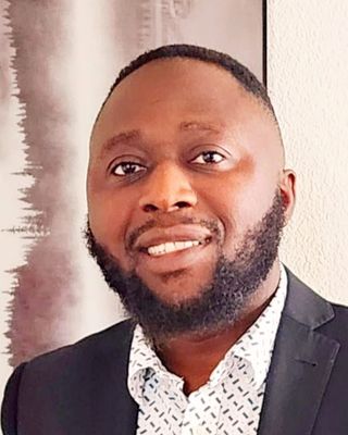 Photo of Olumide Remi-Johnson, Psychiatric Nurse Practitioner, APRN, FNP-C, PMHNP