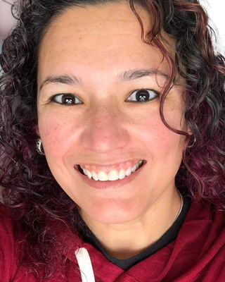 Photo of Emily Santoyo, Licensed Professional Counselor, LPC-S, LMHC, CMHC