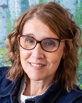 Photo of Adriana Amorim, Psychotherapist, MA, MBACP