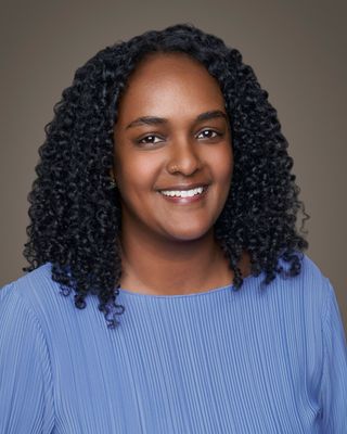 Photo of Dina Gebretatios, Pre-Licensed Professional, LMHCA