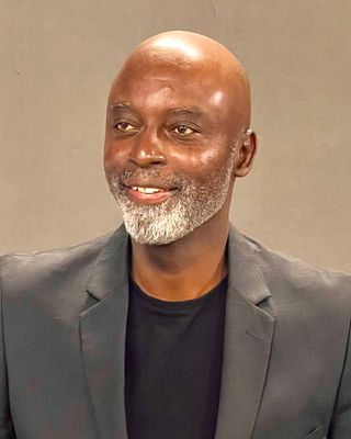 Photo of Dr. Bernie J. Justilien, Registered Mental Health Counselor Intern, EdD, OrgPsyc