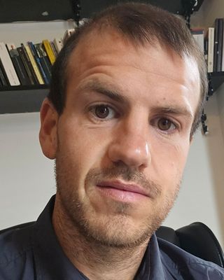 Photo of Adam Russell, Psychotherapist, MA, MBABCP