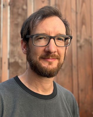 Photo of Andrew Cooke, Counsellor, UKCP Trainee