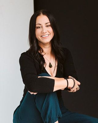 Photo of Carly Reinkeluers, Registered Psychotherapist, RP, BCN, MA, Bed, BAH