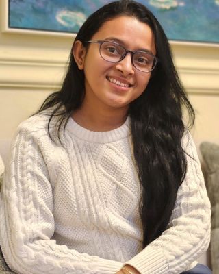 Photo of Mousumi Saha, Registered Psychotherapist, MSc, Mphil