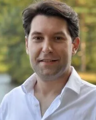 Photo of Julien Faure, Marriage & Family Therapist, LMFT, JD, MS, LLM